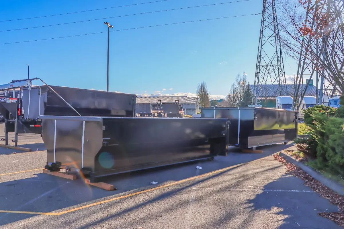 Roll-off dumpster ready for waste disposal at job site for 12 Yard Dumpster Rental in Hamilton